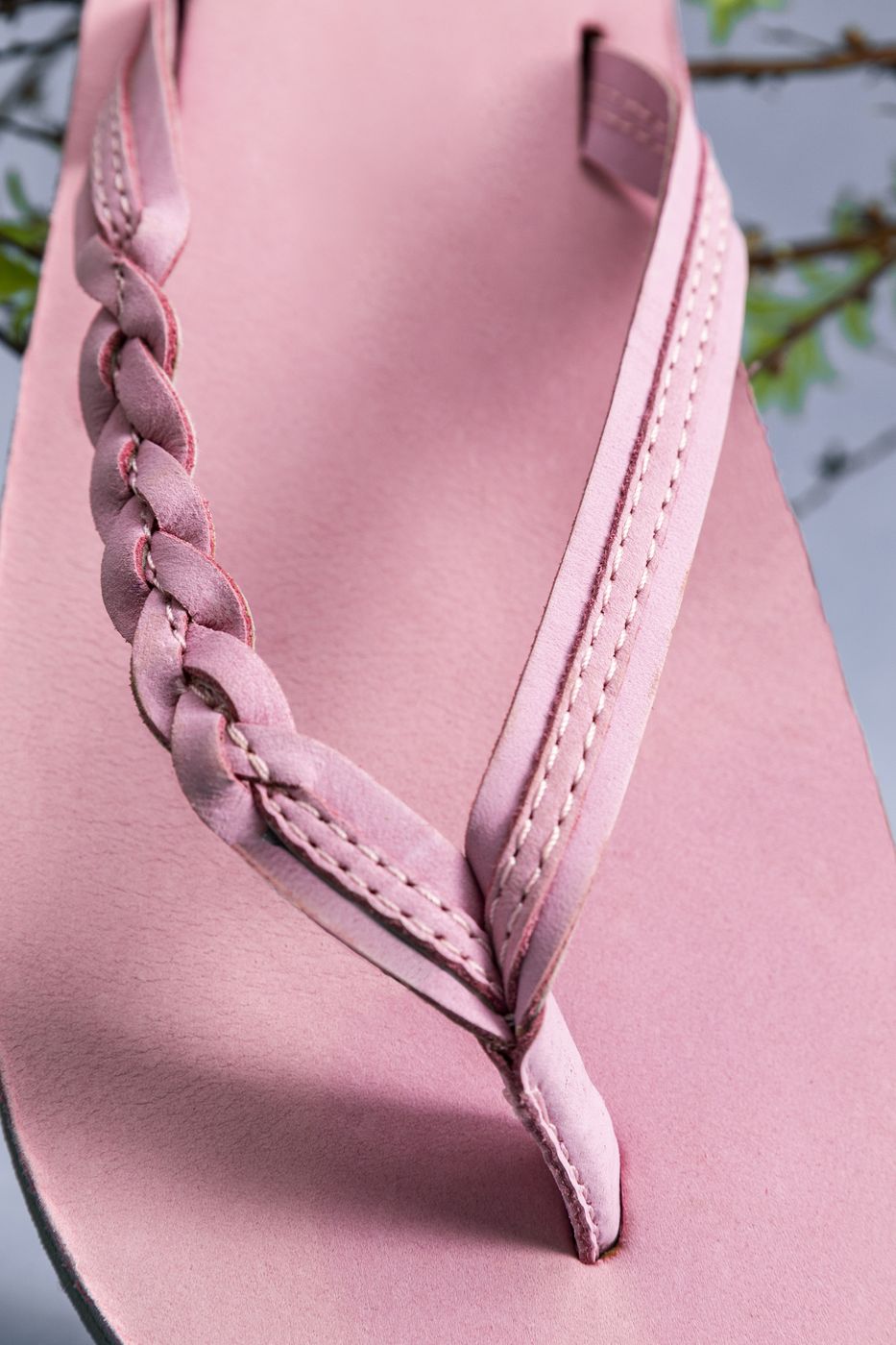 Hand-braided leather strap detail